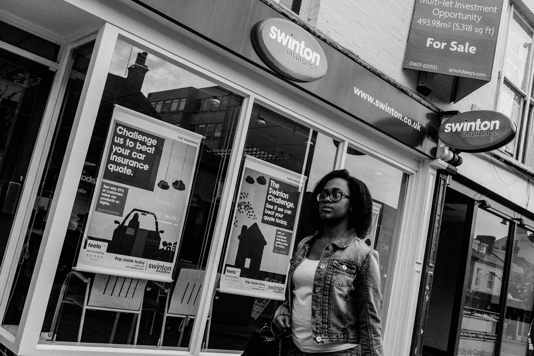 Estate agent storefront window on a high street